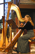 Performing on the harp in Los Altos