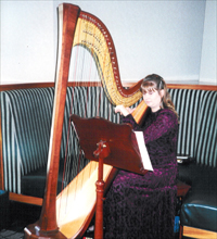 Providing harp music for Sunday brunch at the San Jose Hilton hotel