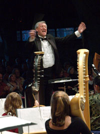 Conductor at harp concert